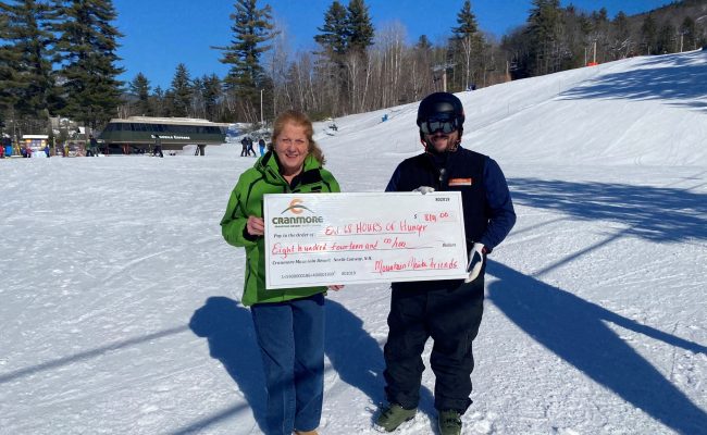 Karen Dolan and Kevin Hamlin with check to End 68 Hours of Hunger