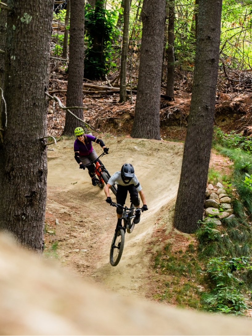 two riders on downhill flow trail
